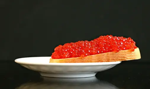 The safe rate of consumption of red caviar is no more than 20 grams per day